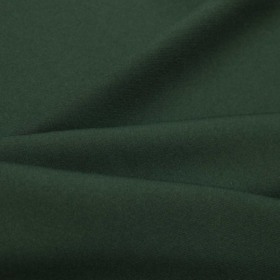 Ткань костюмная 21010 2076, 225 гр/м2, шир.150см, цвет т.зеленый - купить в Новокузнецке. Цена 390.73 руб.